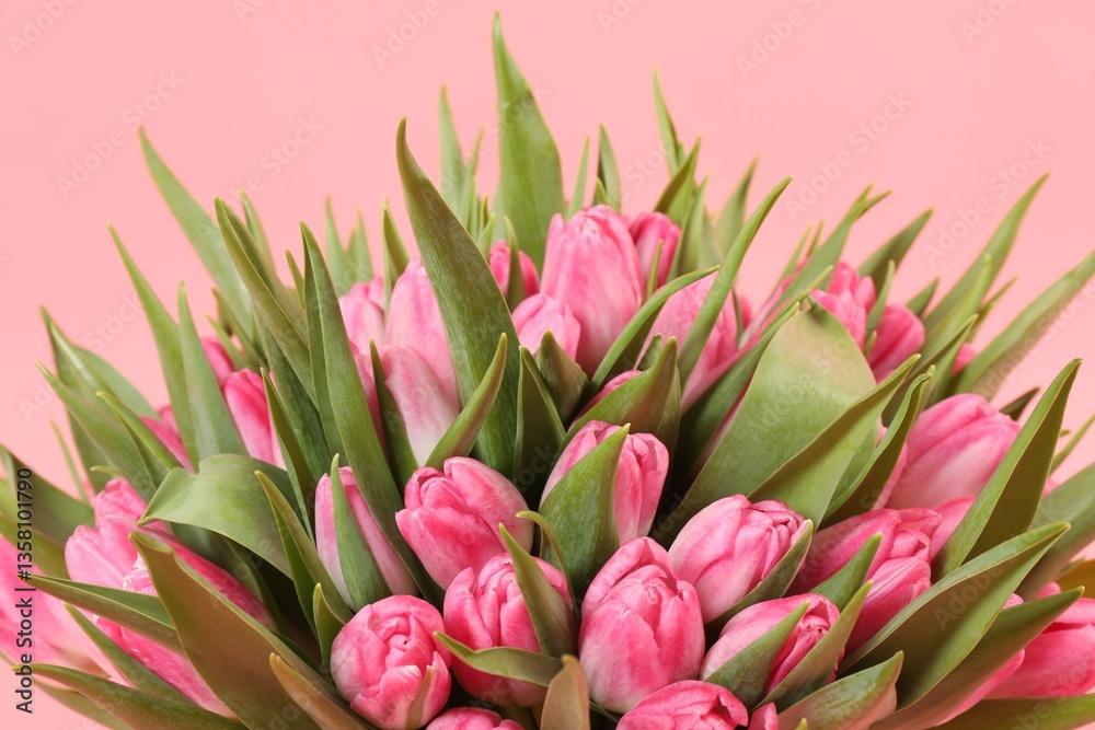 Fototapeta premium Bouquet of beautiful tulips on pink background, closeup