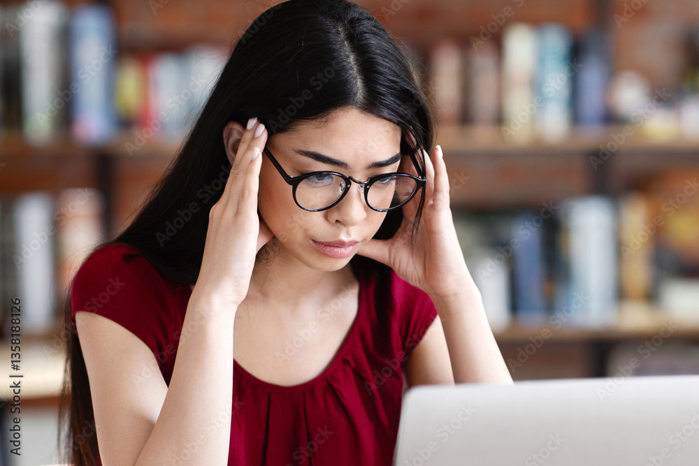 Asian Nerd Student Girl Studying Online With Laptop In Cafe, Touching Temples, Trying To Concentrate, Preparing For Difficult Exam Asian Nerd Student Girl Studying Online With Laptop In Cafe, Touching Temples, Trying To Concentrate, Preparing For Difficult Exam