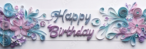 
Beautiful paper quilling of a scroll with a beautiful floral design in light purple and blue colors, with the text 
