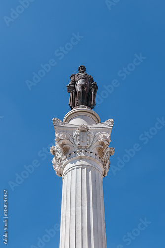 Obraz na płótnie Column of Pedro IV (Coluna de Don Pedro IV) -King Peter IV of Portugal and Algarves monument in Rossio Square (1870). Pedro IV Statue sits atop a 23-metre column. Lisbon, Portugal. w salonie