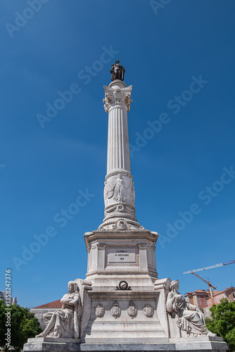 Obraz na płótnie Column of Pedro IV (Coluna de Don Pedro IV) -King Peter IV of Portugal and Algarves monument in Rossio Square (1870). Pedro IV Statue sits atop a 23-metre column. Lisbon, Portugal. w salonie