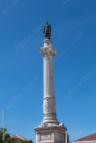 Obraz na płótnie Column of Pedro IV (Coluna de Don Pedro IV) -King Peter IV of Portugal and Algarves monument in Rossio Square (1870). Pedro IV Statue sits atop a 23-metre column. Lisbon, Portugal. w salonie
