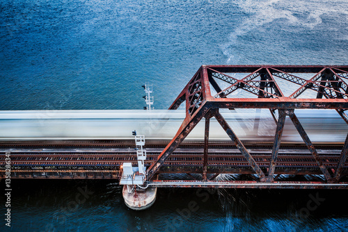 A train crossing a bridge over the St Johns River in Jacksonville Florida