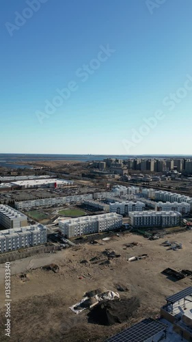 Aerial view over Brooklyn featuring Belt Parkway, Shirley Chisholm State Park, Spring Creek Beach, Pennsylvania Ave, Flatlands Ave, and Howard Beach.