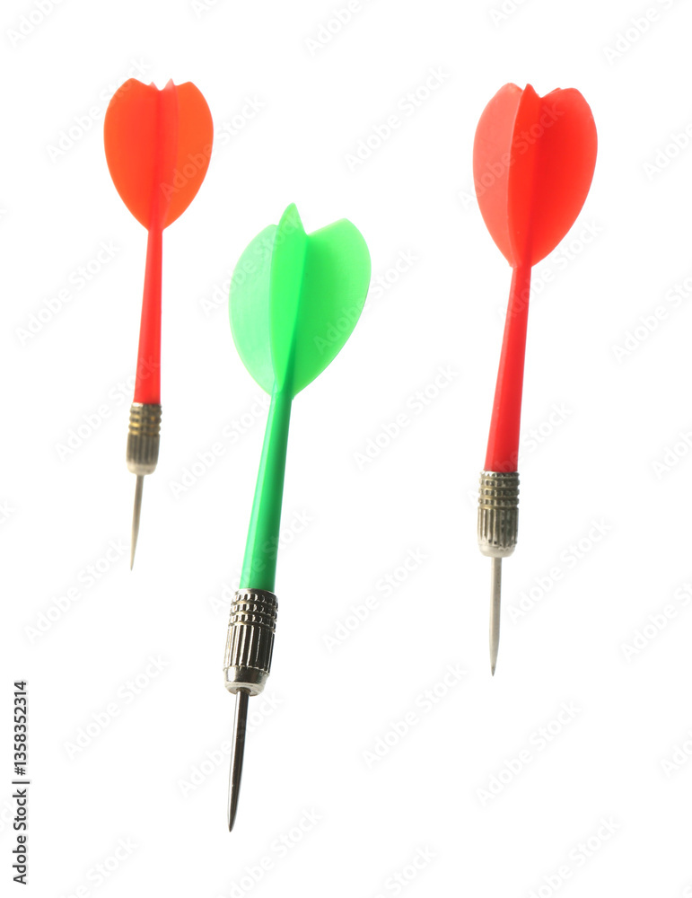 Colorful dart arrows in air isolated on white. Sports equipment Colorful dart arrows in air isolated on white. Sports equipment