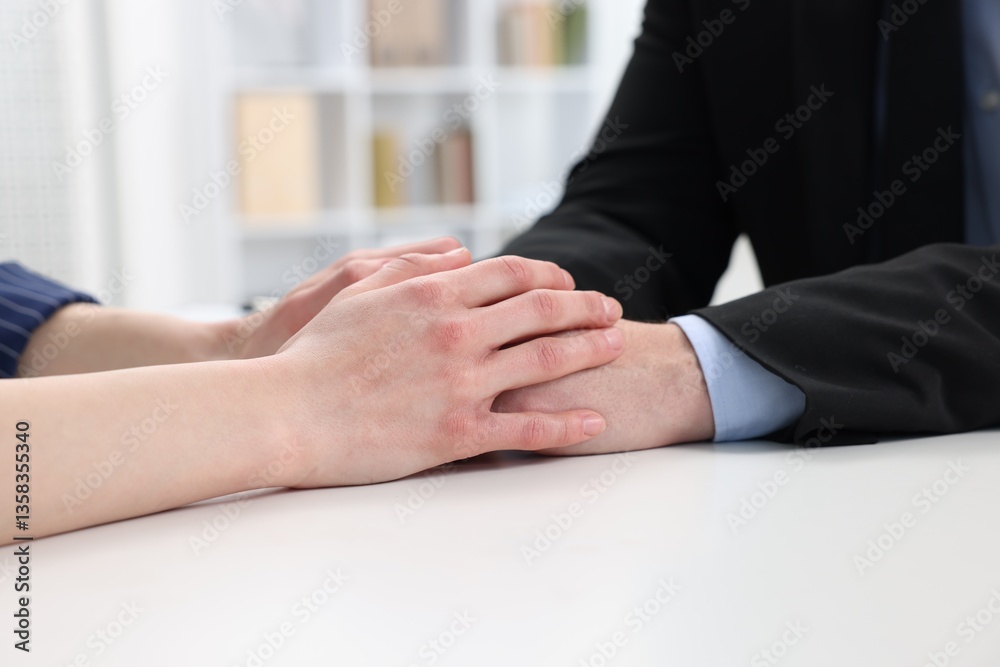 Fototapeta premium Dependent man having appointment with addiction specialist in clinic, closeup