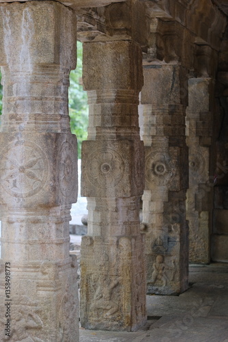 Stone carved pillar inside a Buddhist Temple strucutre in Sri Lanka