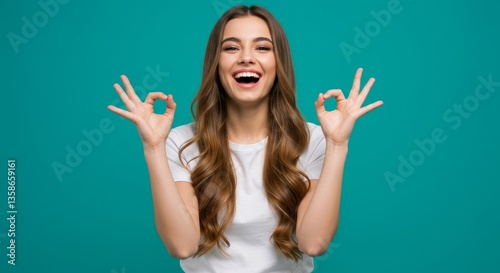 Happy woman giving the okay sign.