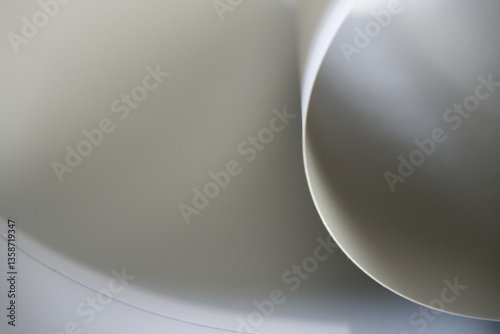 Cardboard curve blur background with grey texture. Abstract background of hard paper. Soft gray, shade, shadow, craft, circle, and material concepts for graphic, texture, wallpaper. Grey background.