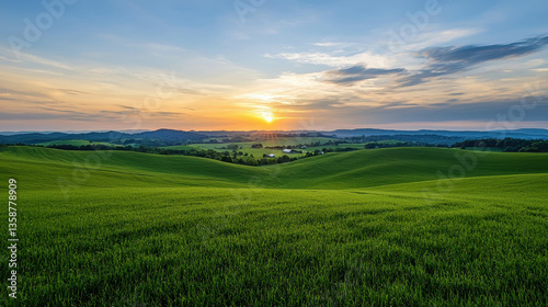Beautiful Sunrise Over Lush Green Rolling Hills and Fields in Countryside Landscape