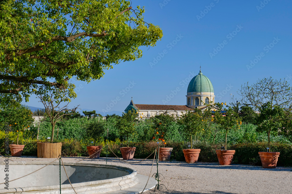 The dome of a church seen from the garden of Capodimonte park in Naples, Italy.