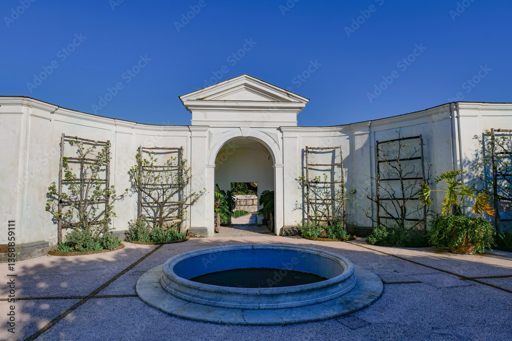Entrance gate in the garden of Capodimonte park in Naples, Italy.