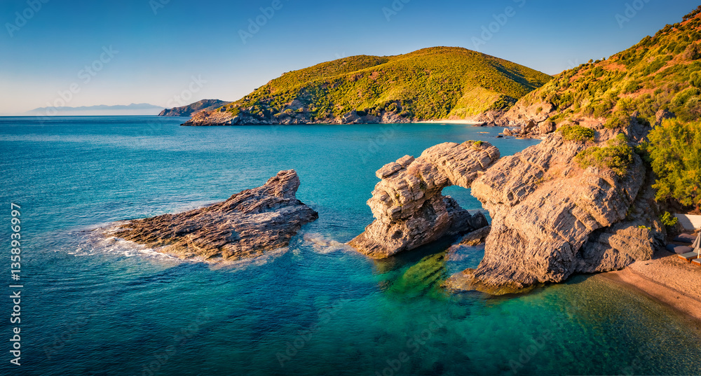 Attractive morning view of Kama beach in Kalamos village. Sunny outdoor scene of Euboea island, Greece, Europe. Colorful summer seascape of Aegean sea. Vacation concept background..