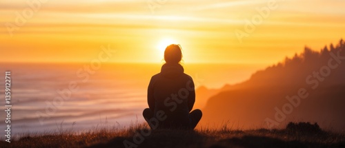 Woman sitting watching the sunset