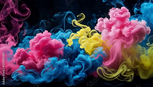 Colorful paints drops into the water on dark background