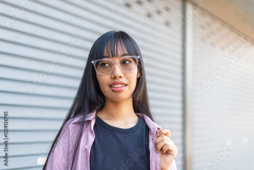 Canvastavla Young asian woman in tinted glasses smiling and looking, beautiful portrait, con
