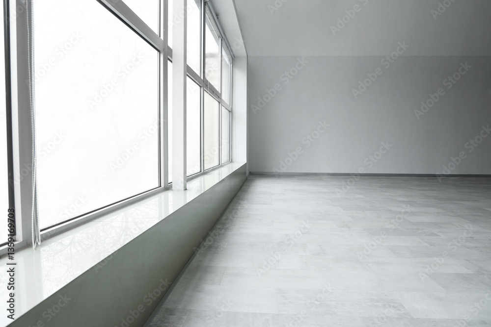Obraz premium Empty room with stylish clean laminate flooring