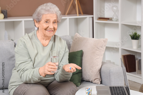 Senior woman with pills and...