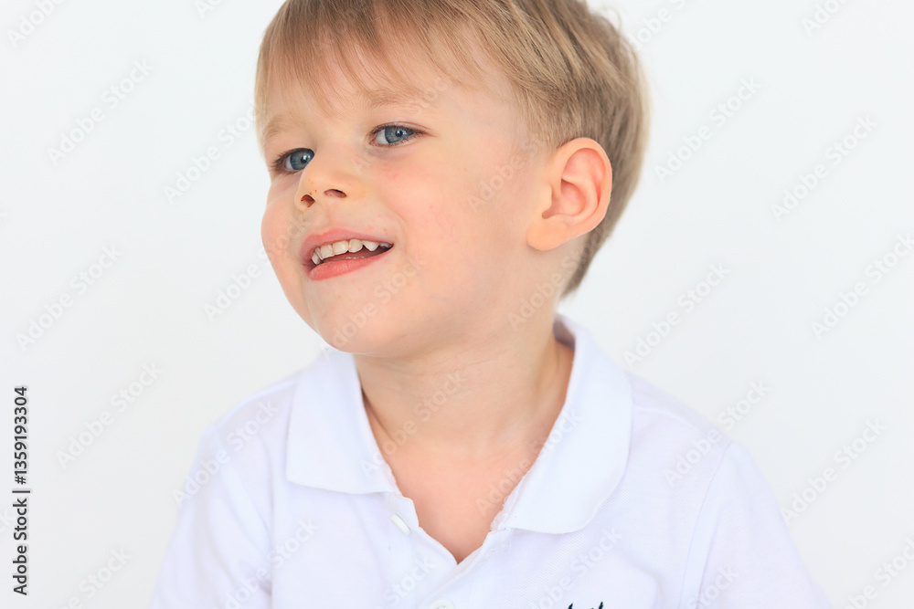 emotional portrait of a 4-6-year-old boy on a white background, cheerful and surprised child emotional portrait of a 4-6-year-old boy on a white background, cheerful and surprised child