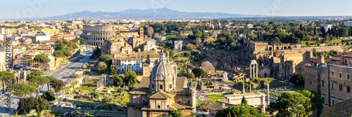 Rome skyline Roman Forum and Colosseum aerial view panorama ancient historical temple ruins in Italy