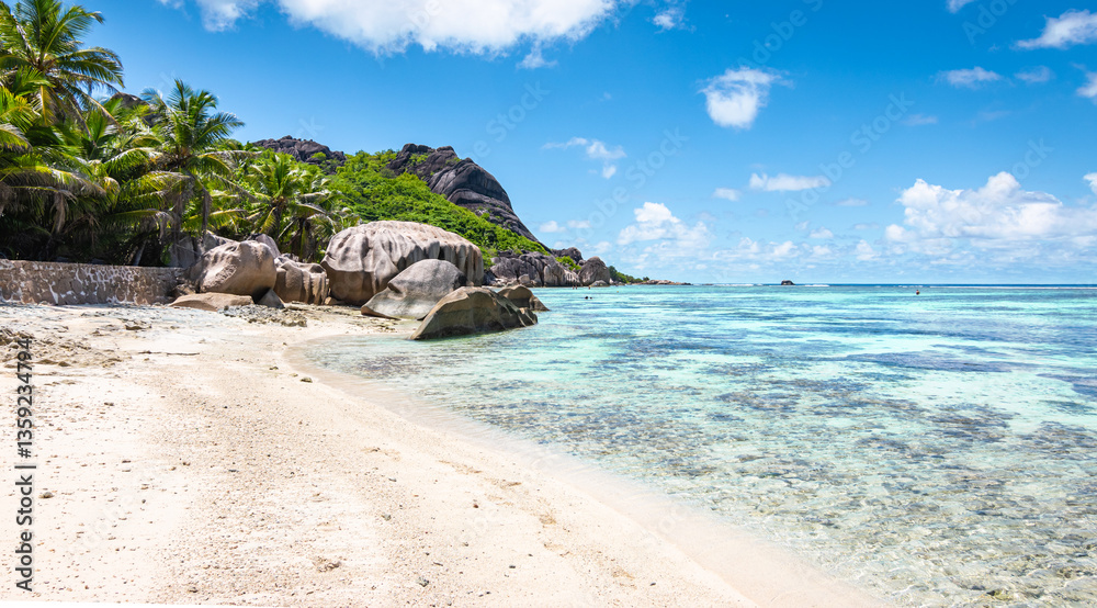 Tropical Beach with Palm Trees. Anse Source d' Argent, La Digue Island , Seychelles