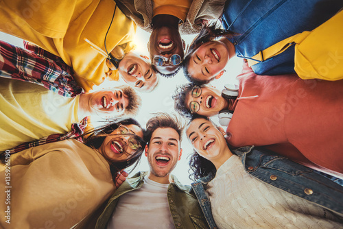 Multi racial group of friends standing in circle smiling at camera together - Group of young people taking selfie portrait outside - Youth community with guys and girls hanging out