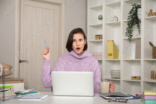 Shocked female student with...