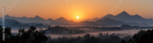 The vibrant sunrise paints the mountain silhouettes beautifully with light