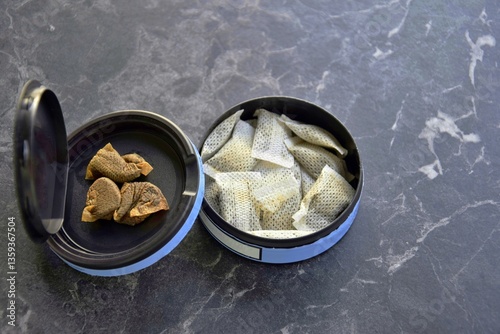 Φωτογραφία A box of snus pads is a substitute for smokeless cigarettes