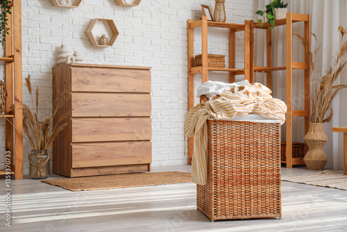 Wicker basket full of dirty...