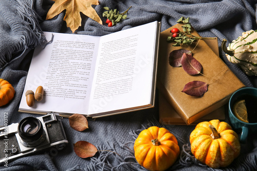Books with autumn leaves, p...