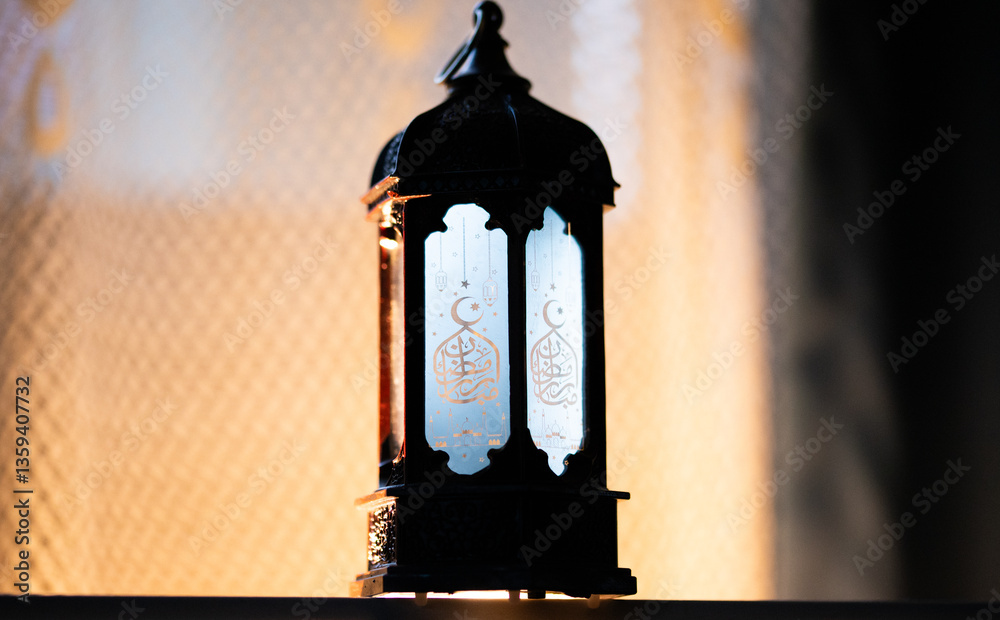 ornamental Arabic lantern Ramadan and Eid al-Fitr greeting card. The arabic calligraphy translation is Ramadan Mubarak