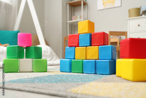 Colorful cubes on floor in ...