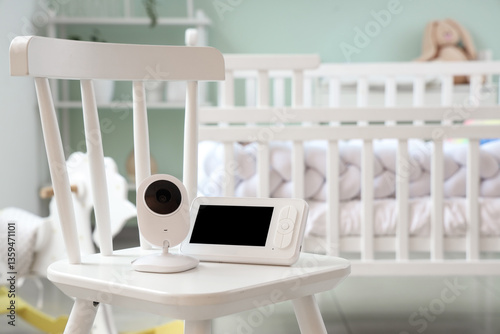 Baby monitor on chair in ch...