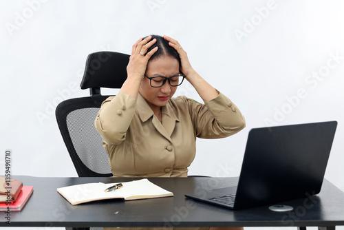 Wallpaper Mural Frustrated asian civil servant female at office. Isolated on white background Torontodigital.ca