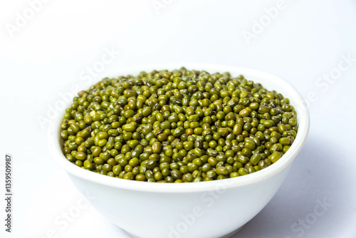 Obraz na plátně Green Moong Dal beans in a White Bowl Isolated on a white background