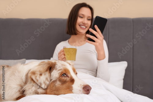 Happy young woman with mode...