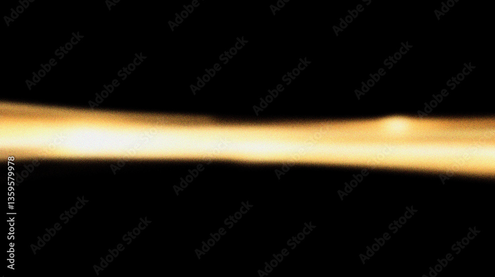 Grain noise texture Golden streak across dark background, resembling light beam or stream Grain noise texture Golden streak across dark background, resembling light beam or stream