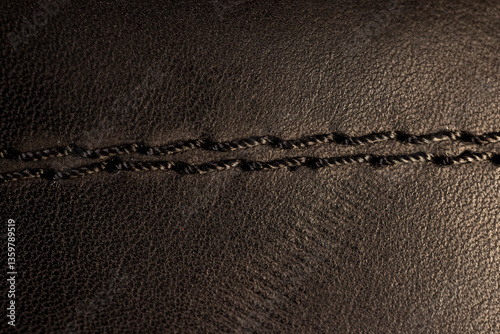 genuine leather painted black with seams after joining photo