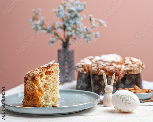 Colomba - Italian traditional Easter bread is topped with pearl sugar and almonds in the shape of a dove. Festive pastries are traditional in Italy.