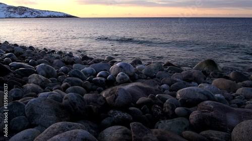 March evening on the Dragon Eggs Beach. The coast of the Barents Sea. Teriberka, Murmansk region, Russia