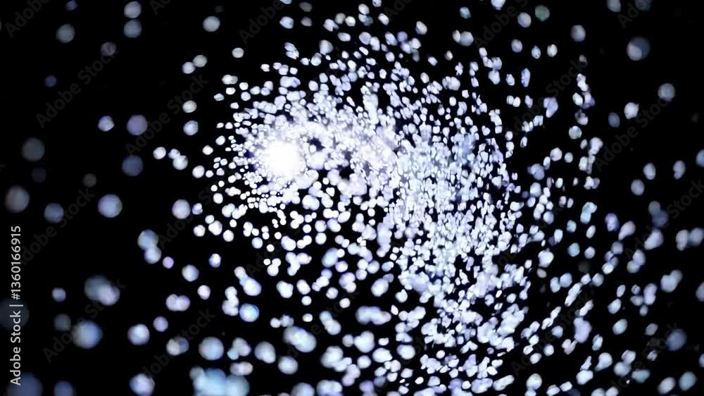 Mesmerizing spiral of glowing particles in dynamic motion against a dark background Mesmerizing spiral of glowing particles in dynamic motion against a dark background