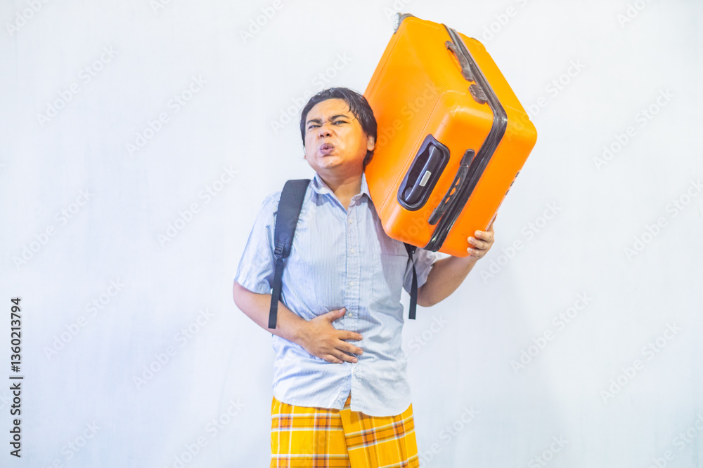 Portrait Asian muslim man carrying suitcase . Concept Going home for Eid Mubarak. Isolated image on white background