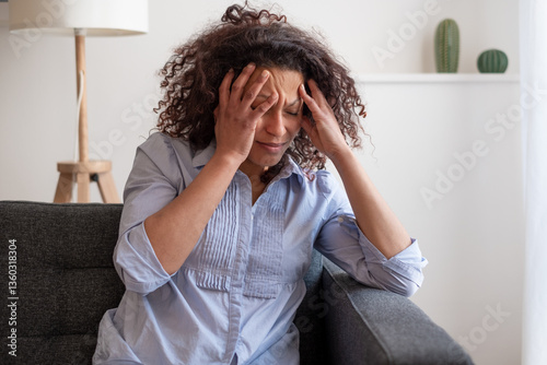 Alone black woman feeling sad and depressed at home