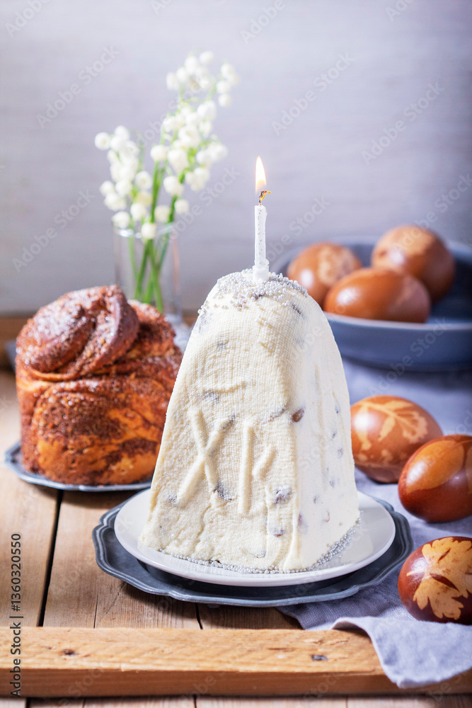 Curd paskha, Easter kulich and painted eggs, traditional Easter symbols consecrated in the church.
