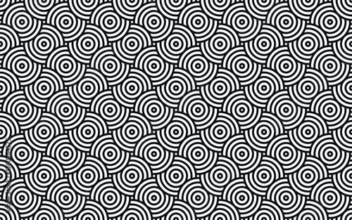 Repeating black circular arc pattern in white grid