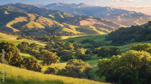 A serene scene of a lush green valley nestled amidst rolling mountains, bathed in the warm glow of sunlight. The image conveys a sense of peace, tranquility, and natural beauty.