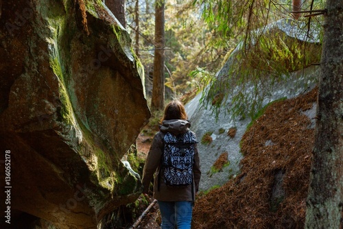 young woman hiking in the mountains