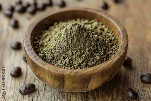 a wooden bowl full of ground green coffee powder lies on a wood plane the light green powder brews green coffee with health gains  
 photo
