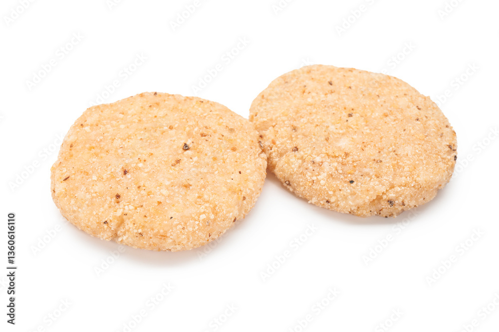 Two uncooked fresh patties isolated on white Two uncooked fresh patties isolated on white